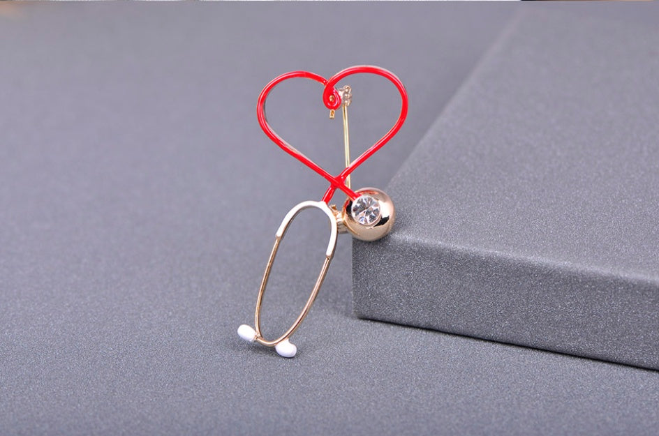 Creative stethoscope brooch